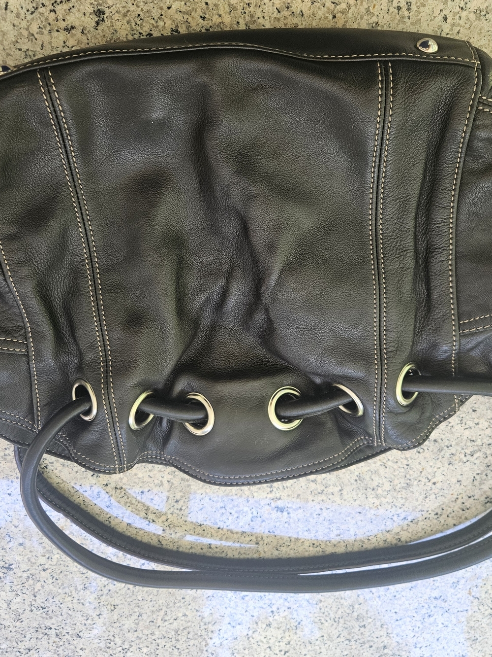 Tignanello Black Leather Shoulder Bag with Grommet Ring Detail